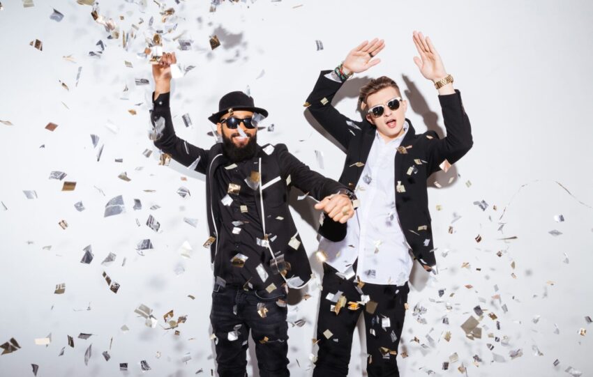Two men dancing on party